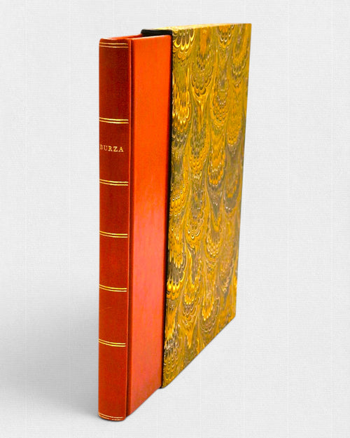Ekskluzywne wydanie „Burzy” Williama Szekspira w ręcznej oprawie skórzanej, z czerwonym grzbietem ze złoceniami oraz dekoracyjnym, marmurkowym etui.
